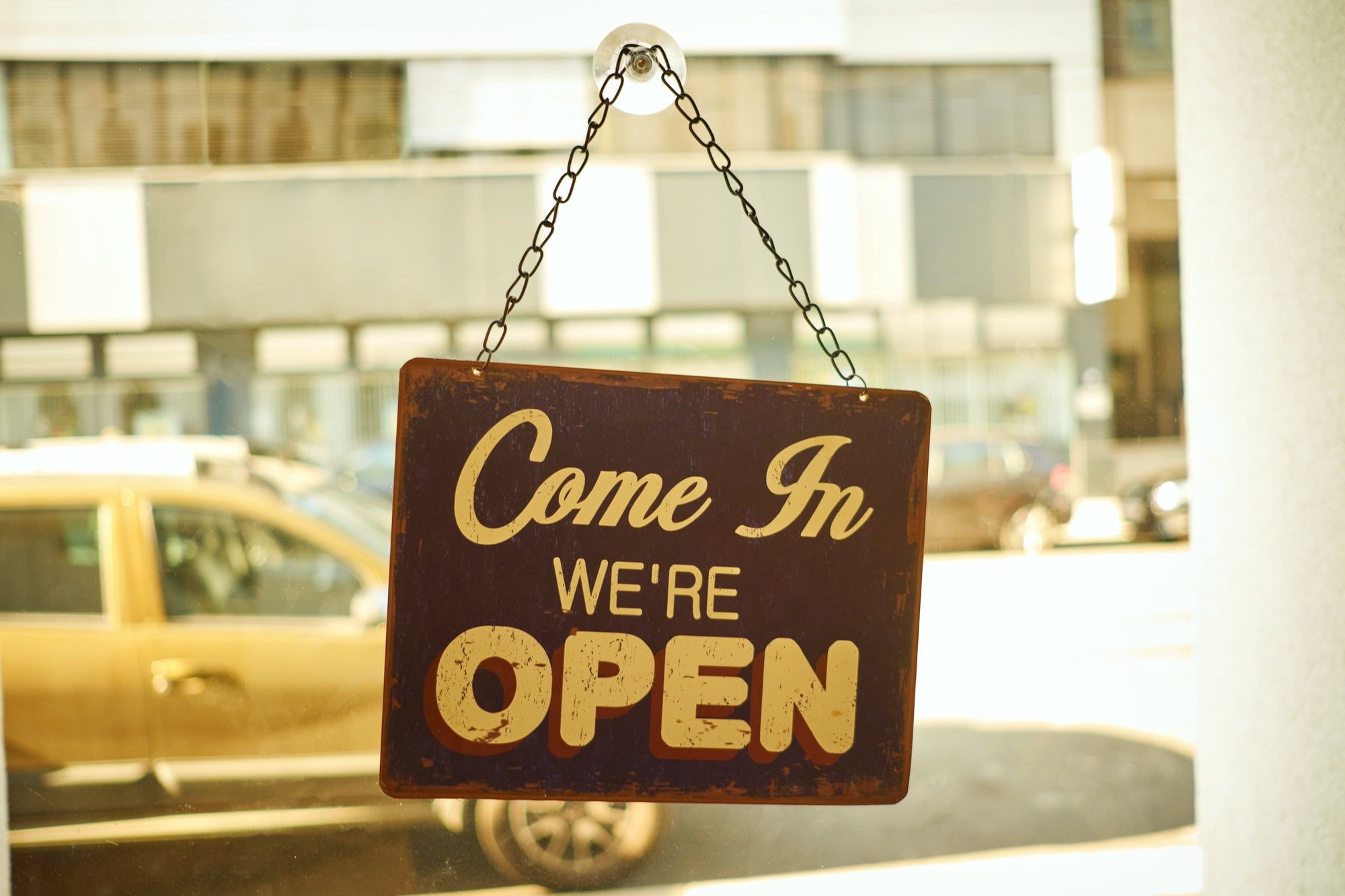 Open sign at small business window